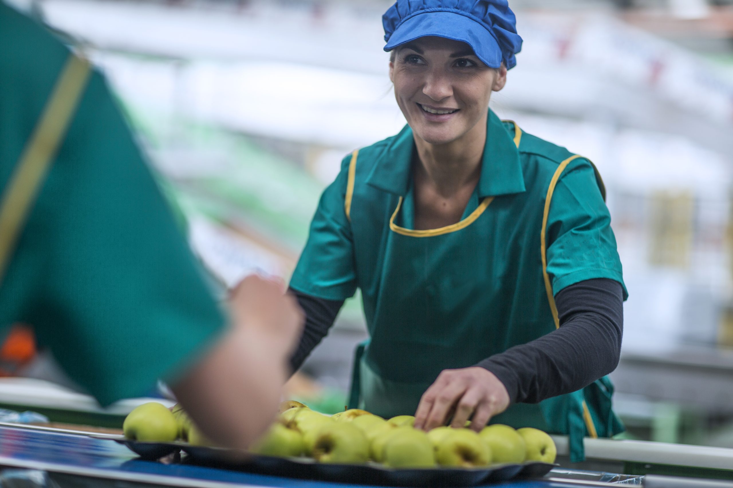woman working in apple factory